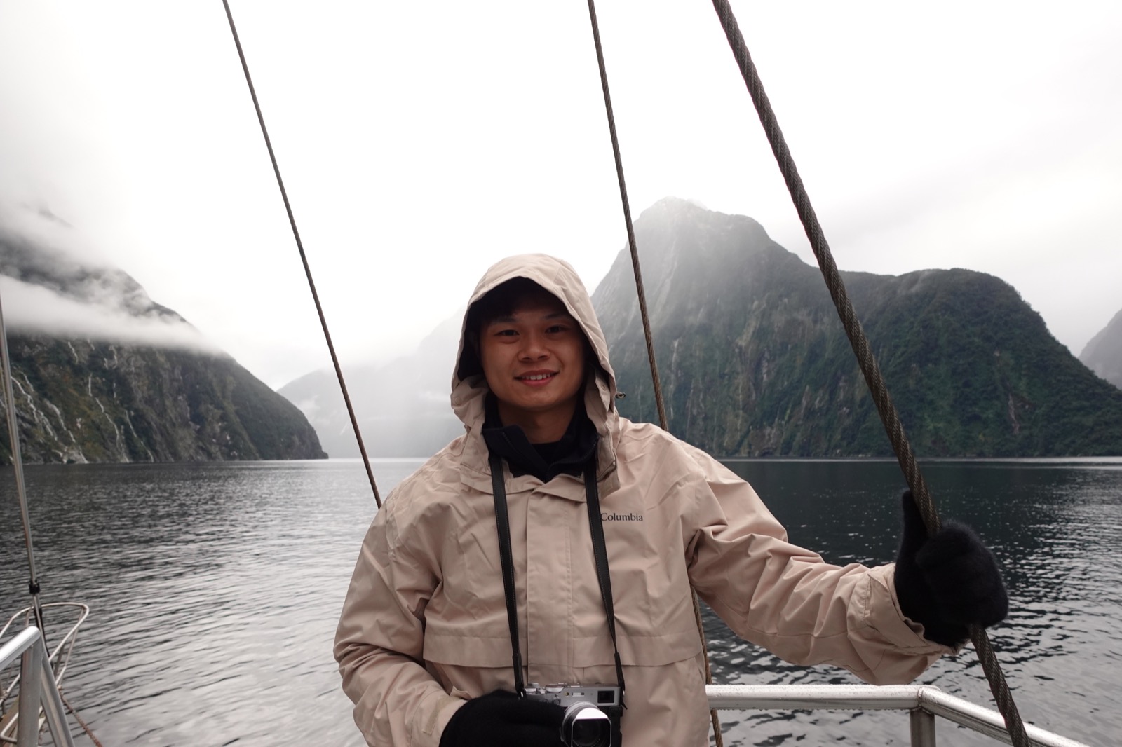 Shawn Lee on a misty mountain lake.